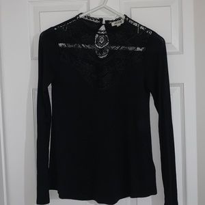 Black top with mesh design